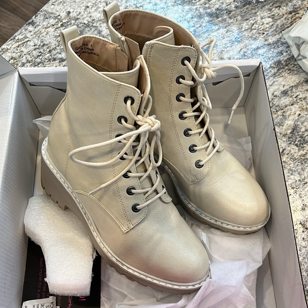 Hey Girl cream colored boots.
